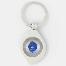 Llavero Flores de plata metálica y elegancia floral