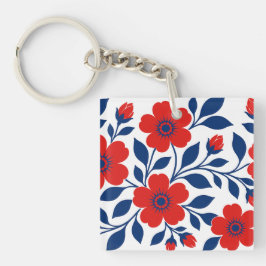 Llavero Flores Rojas Intensas y Hojas Azules de Marina
