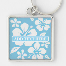 Llavero Flores tropicales de playa azul