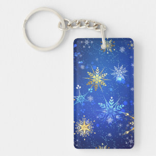 Llavero Fondo azul de NAVIDAD con copos de nieve dorados