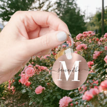 Fotomonograma de firma moderna en hoja de oro rosa