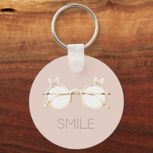 Llavero Gafas sonrientes de orejas de conejo blancas y ros