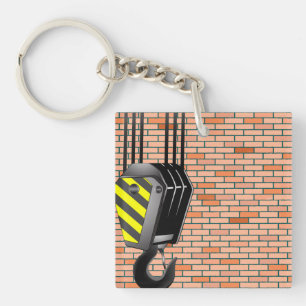 Llavero Gancho de grúa industrial con pared de ladrillo