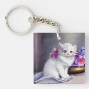 Llavero Gatito blanco vintage con flores rosadas y moradas