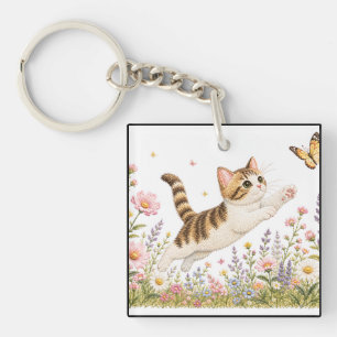 Llavero Gatito Bordado Persiguiendo Mariposa en Flor Silve