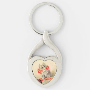 Llavero Gatito con cinta roja