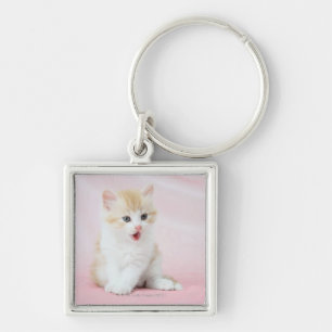 Llavero Gatito en fondo rosado