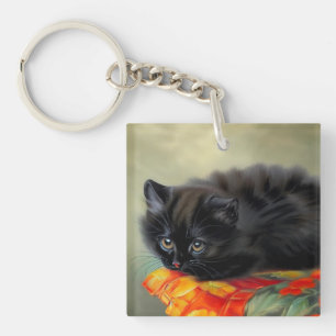 Llavero Gatito negro vintage con manta de flores rojas