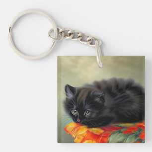 Llavero Gatito negro vintage con manta de flores rojas
