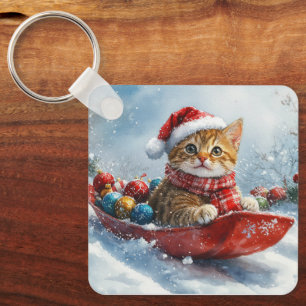 Llavero Gato abisinio en trineo Deja que nieve Navidad