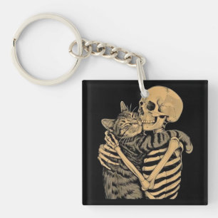 Llavero Gato abrazando esqueleto – Regalo para amantes de