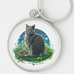 Llavero Gato gris en el jardín de flores