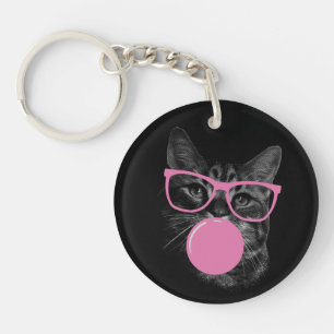 Llavero Gato Guay con gafas rosas y goma de burbuja