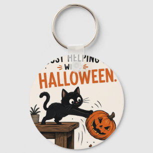 Llavero Gato negro divertido derribando una calabaza de Ha