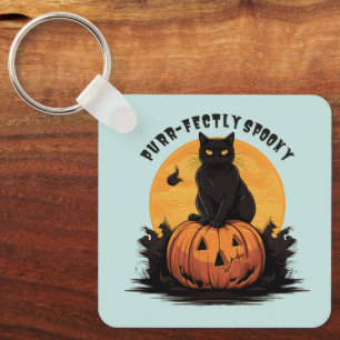 Llavero Gato negro perfectamente espeluznante en calabaza