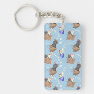 Llavero Gatos en caja y gotas de leche en azul