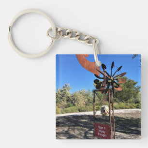 Llavero Girar un pensamiento feliz, un Rótulo gracioso