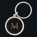 Llavero Girly Black Gold Monograma Nombre Elegante Guión d<br><div class="desc">Monograma de oro negro simple Moda elegante nombre de guión moderno cadena de claves inicial</div>