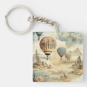 Llavero Globo de aire caliente de época en un paisaje sere