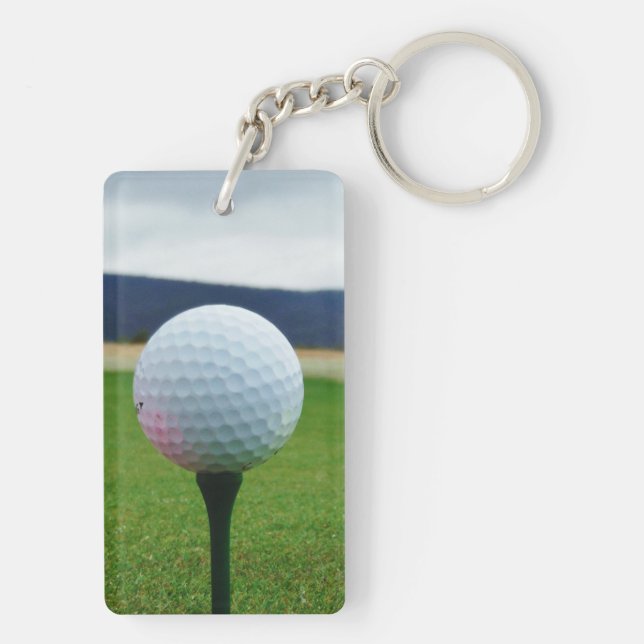 Llavero globo de golf blanco en un campo de golf de montañ (Atrás)