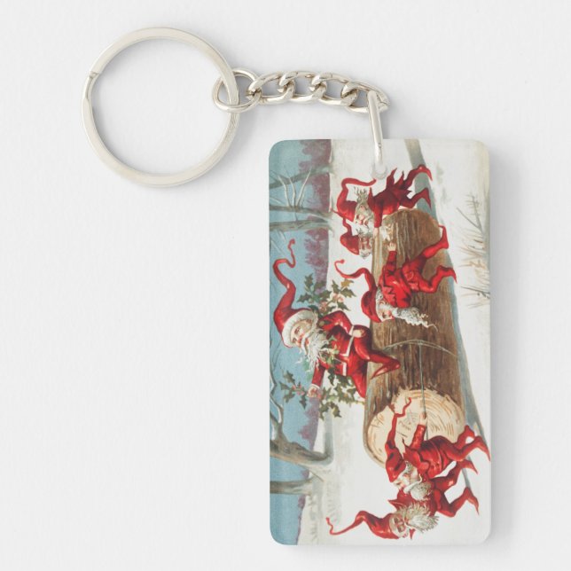 Llavero Gnomes dragging a cut tree trunk through the snow (Frente)