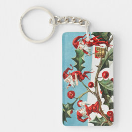 Llavero Gnomes painting holly berries in the snow