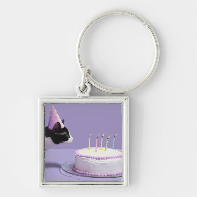 Llavero Gorra del cumpleaños del gato que lleva que sopla (Frente)