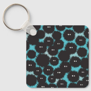 Llavero Graciosos monstruos esponjosos negros