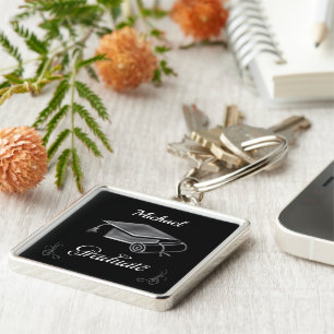 Llavero Graduación en negro y plata, gorra y diploma