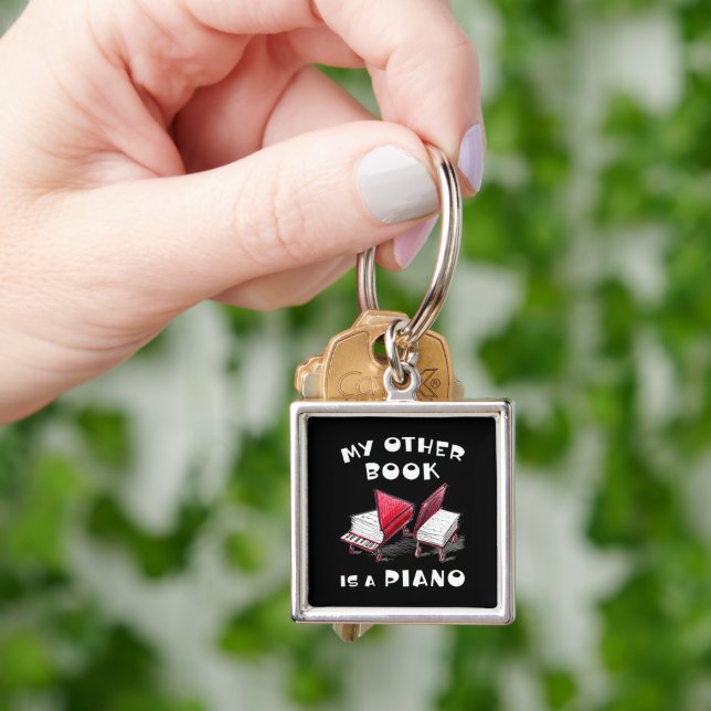 Llavero Grandes ideas sobre ruedas - 🎵 Piano Book (Mano)