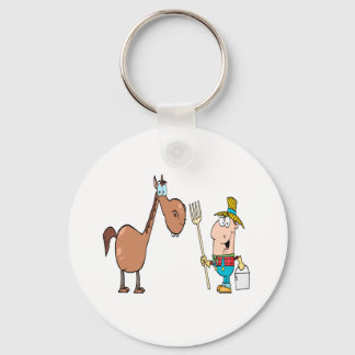 Llavero granjero gracioso con caballo