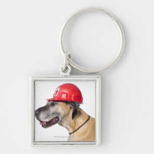 Llavero Great dane que lleva un casco rojo de la