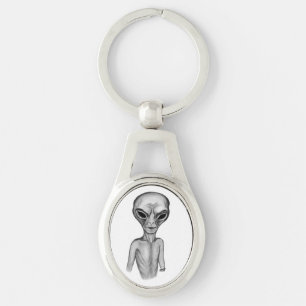 Llavero Grey Alien , quiero creer