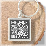 Llavero Gris oscuro | Cadena de claves escaneable de códig<br><div class="desc">¿Busca una potente herramienta de marketing para mejorar su negocio? ¡No busque más que nuestros códigos QR! Con la capacidad de crear un código QR directamente en la cadena de claves, puede dirigir fácilmente a sus clientes a su sitio web, páginas de medios sociales u otras plataformas de medios en...</div>