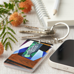 Llavero Gris - Vidrio en una mesa