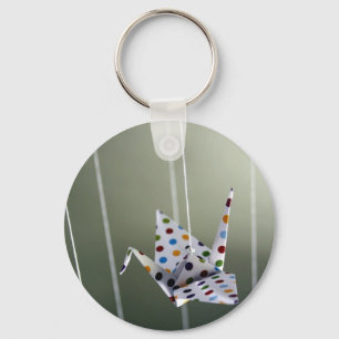 Llavero grúa del origami del lunar