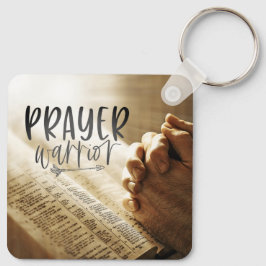 Llavero GUERRA DE ORACIONES orando manos en la Biblia abie