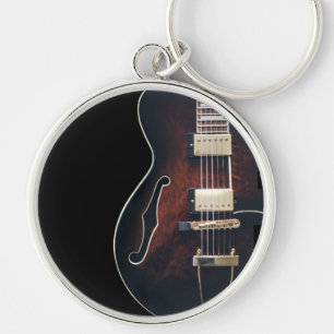 Llavero Guitarra Eléctrica Sobre Negro