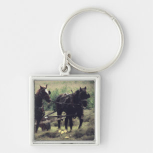Llavero Haciendo heno con caballos