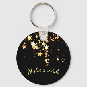 Llavero Haga un deseo en las estrellas del oro que caen en