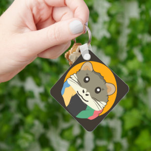 Llavero Hámster 🐹 el animal travieso con una bufanda a ra