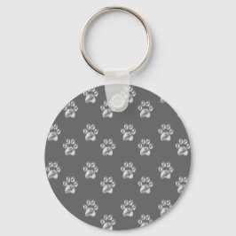 Llavero Hermoso patrón de patas elegante sobre gris oscuro