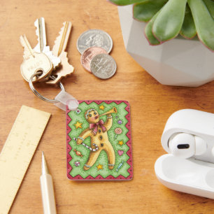 Llavero Hombre de pan de jengibre lindo tocando la bocina,