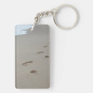 Llavero Huellas en la playa
