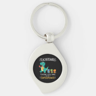 Llavero Humor de Teachersaurus con pequeños dinosaurios