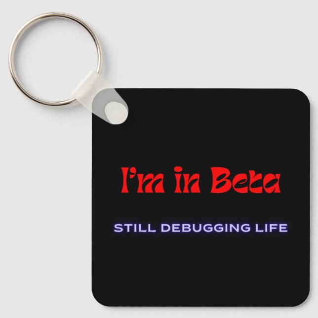 Llavero I’m in Beta – Still Debugging Life | Metal Keychai (Anverso)