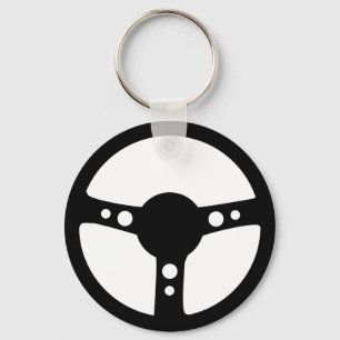 Llavero icono negro del volante que compite con
