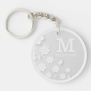 Llavero Iniciales de nombre grabado en relieve floral blan