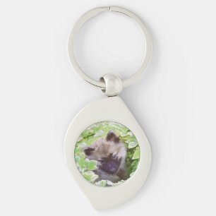 Llavero Keeshond Puppy en el jardín pintando arte original