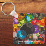 Llavero Keychain<br><div class="desc">Ricky’s art collection was inspired by one of his favorite things—balls! He loves to throw balls,  watch balls,  and hold balls,  which became the perfect inspiration for his artwork. Using paint and balls in a new creative way,  Ricky created a piece full of fun,  movement,  and self-expression.</div>